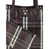 Close-up of Burberry Medium Highlands Tote Bag featuring logo detail and matching detachable pouch in classic plaid print.