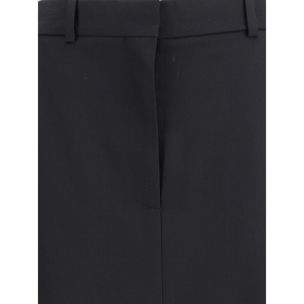 Close-up of The Row Seraphyne skirt waistband and concealed front closure. Crafted from premium virgin wool for a sleek, refined finish.
