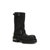 Side angle of Balenciaga Venom Boots showcasing rugged lace-free design, silver-tone hardware, and embossed branding.