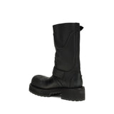 Rear view of Balenciaga Venom Boots highlighting the high shaft, pull tab, and durable treaded outsole for women.
