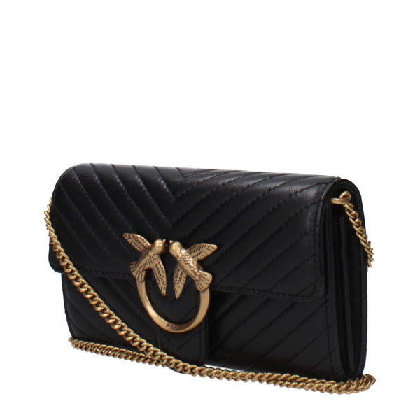 Side view of PINKO Black Leather Clutch Bag featuring quilted chevron pattern and gold-tone hardware for a chic, luxury accessory look.