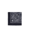 Destin Bandana Scarf in navy blue with white paisley print, folded into a square. Stylish women's accessory for casual or chic outfits.