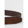Detailed view of Hugo Boss brown leather belt tip, showcasing premium leather texture and craftsmanship.