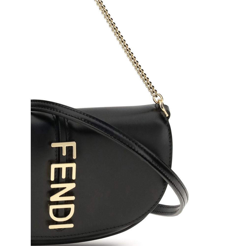 Close-up of Fendi Chain Shoulder Bag highlighting gold FENDI logo and chain strap detail, emphasizing premium craftsmanship and style.